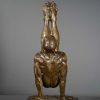 bronze sculpture of male gymnast