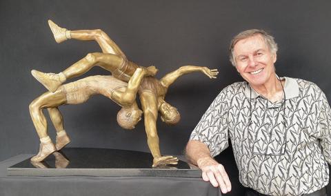 Richard Stravitz with his sculpture.