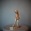 Bronze sculpture of little girl doing a ballet pose in her tutu - front