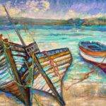 “Remnants” – A colorful painting of two old wooden boats, one leaning and weathered, the other upright, set on calm turquoise water beneath a vibrant, cloud-filled sky with a distant landscape.