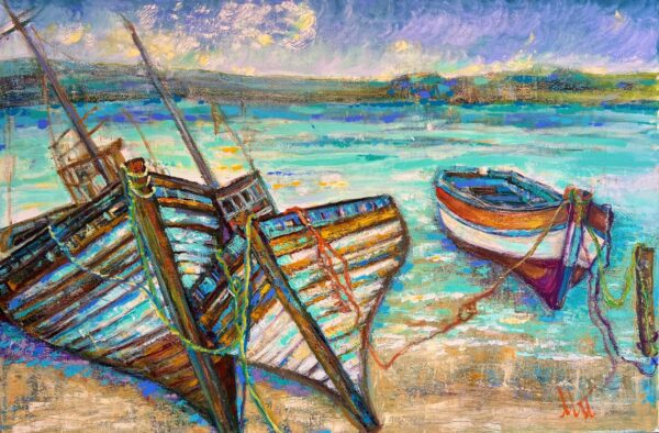 “Remnants” – A colorful painting of two old wooden boats, one leaning and weathered, the other upright, set on calm turquoise water beneath a vibrant, cloud-filled sky with a distant landscape.