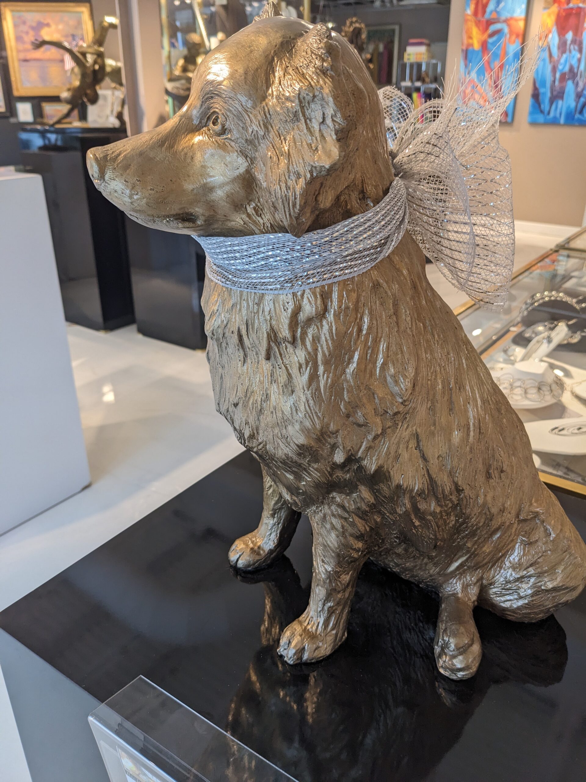 Bronze sculpture of an Australian Shepard