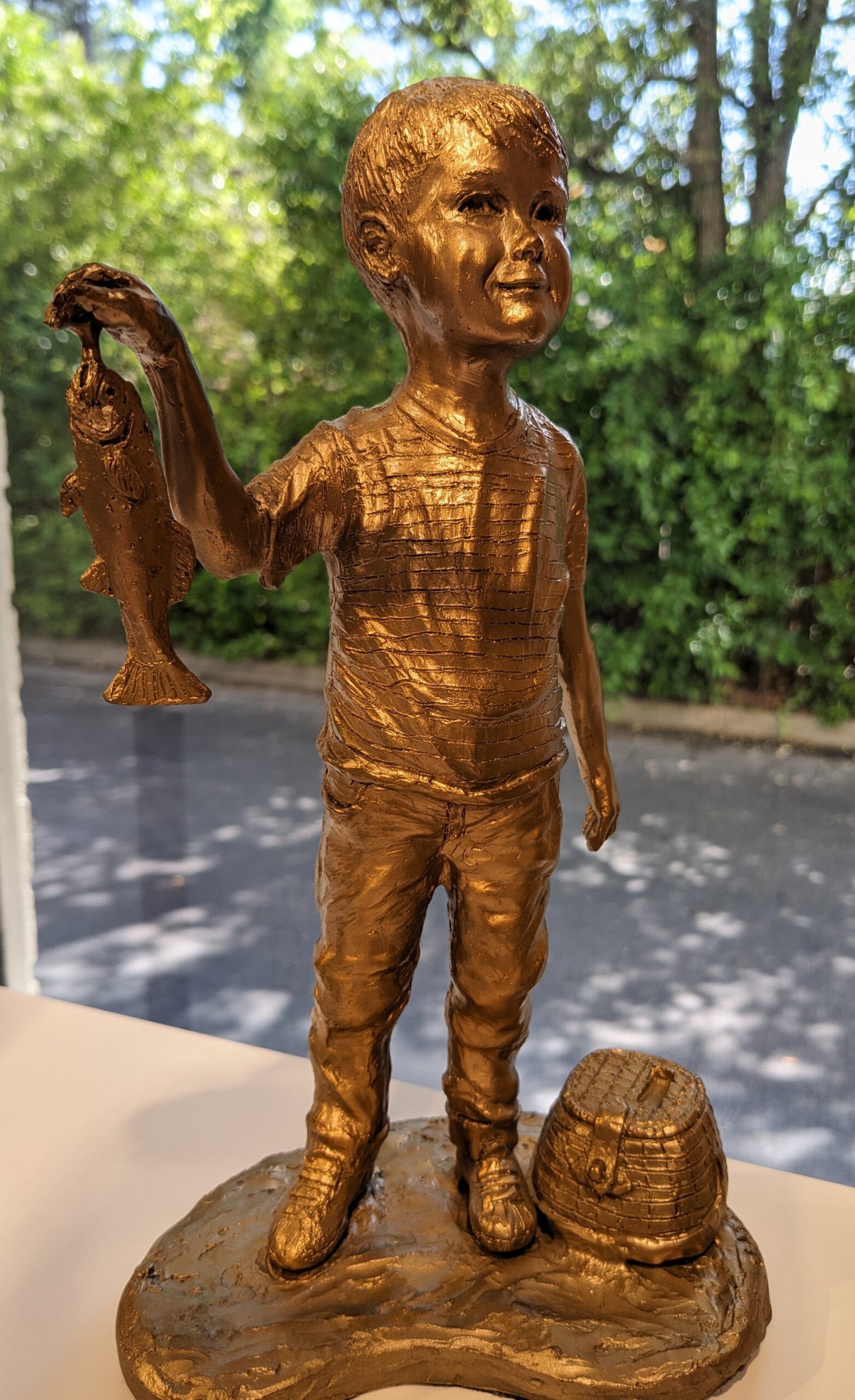 Bronze sculpture of a beloved grandchild