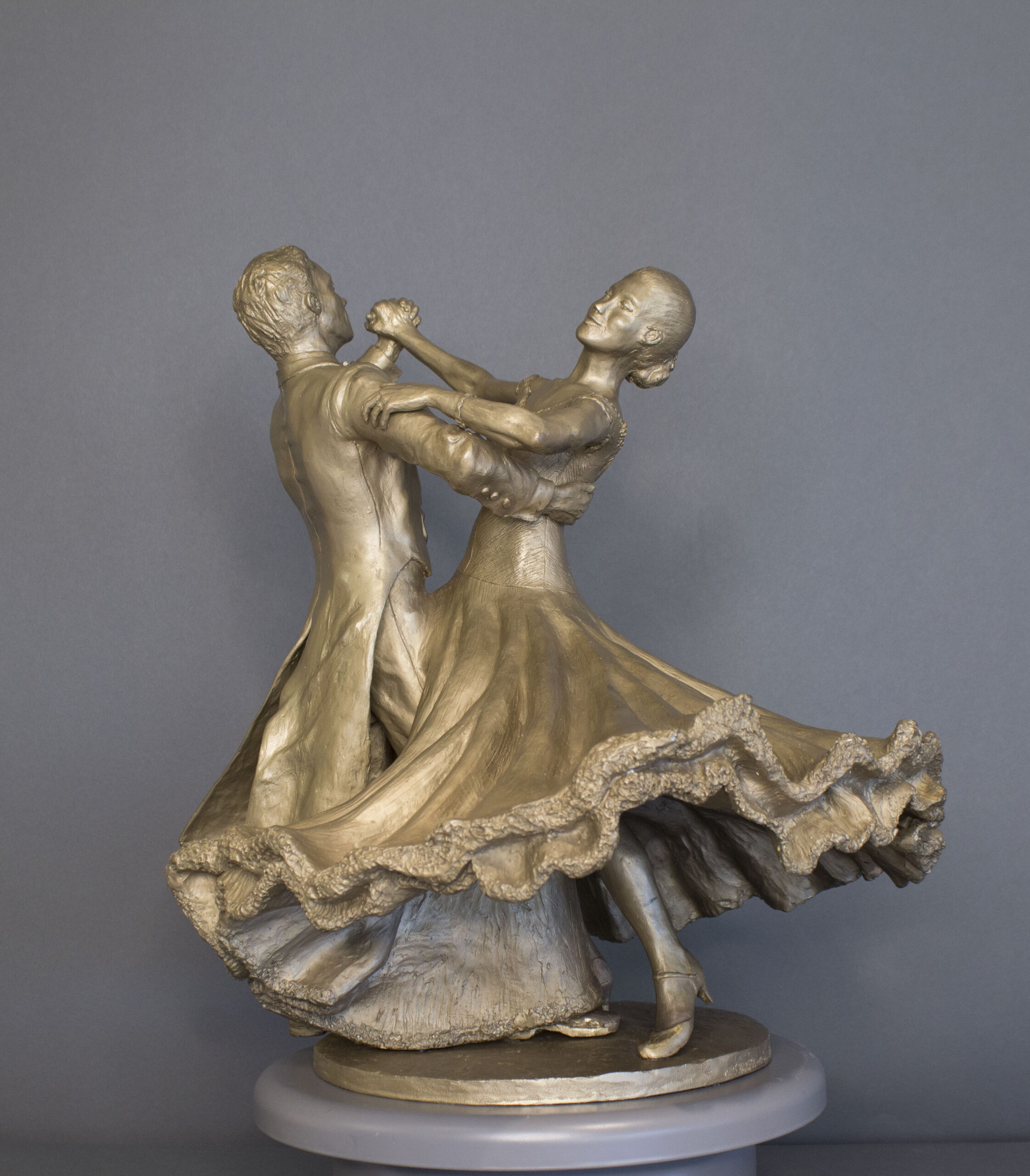 Bronze sculpture of ballroom dancing couple